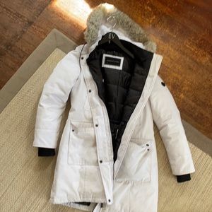 Andrew Marc Puffer jacket can be cleaned